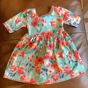 Fun flowery dress with criss cross back